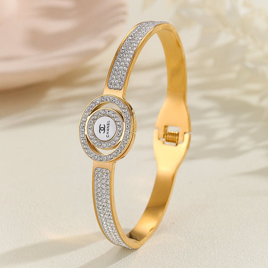 M.E.® Beautiful Gold Chanel Logo Bangle Bracelet